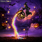 Black metal witch cauldron garden stake light with cascading LED string lights in a Halloween night garden